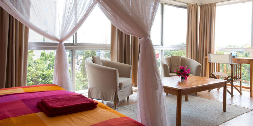 Q-Bar & Guesthouse Darüsselam Dış mekan fotoğraf