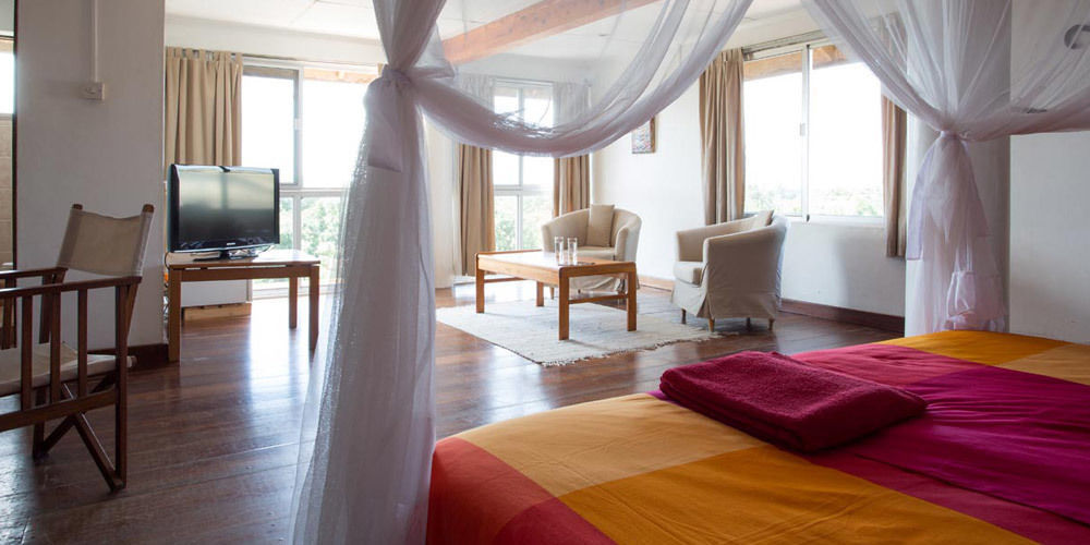 Q-Bar & Guesthouse Darüsselam Dış mekan fotoğraf